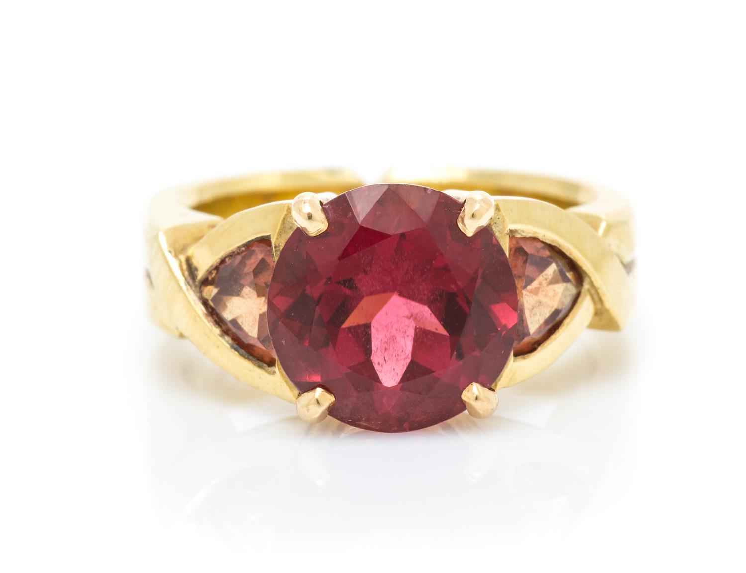An 18 Karat Yellow Gold, Tourmaline and Sapphire Ring, Frank Ancona, 7.85 dwts.
