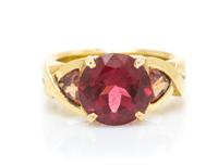 An 18 Karat Yellow Gold, Tourmaline and Sapphire Ring, Frank Ancona, 7.85 dwts.