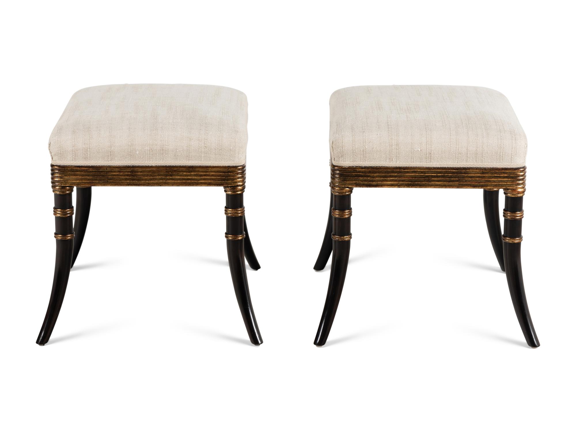 A Pair of Rose Tarlow Ebonized and Parcel-Gilt Stools