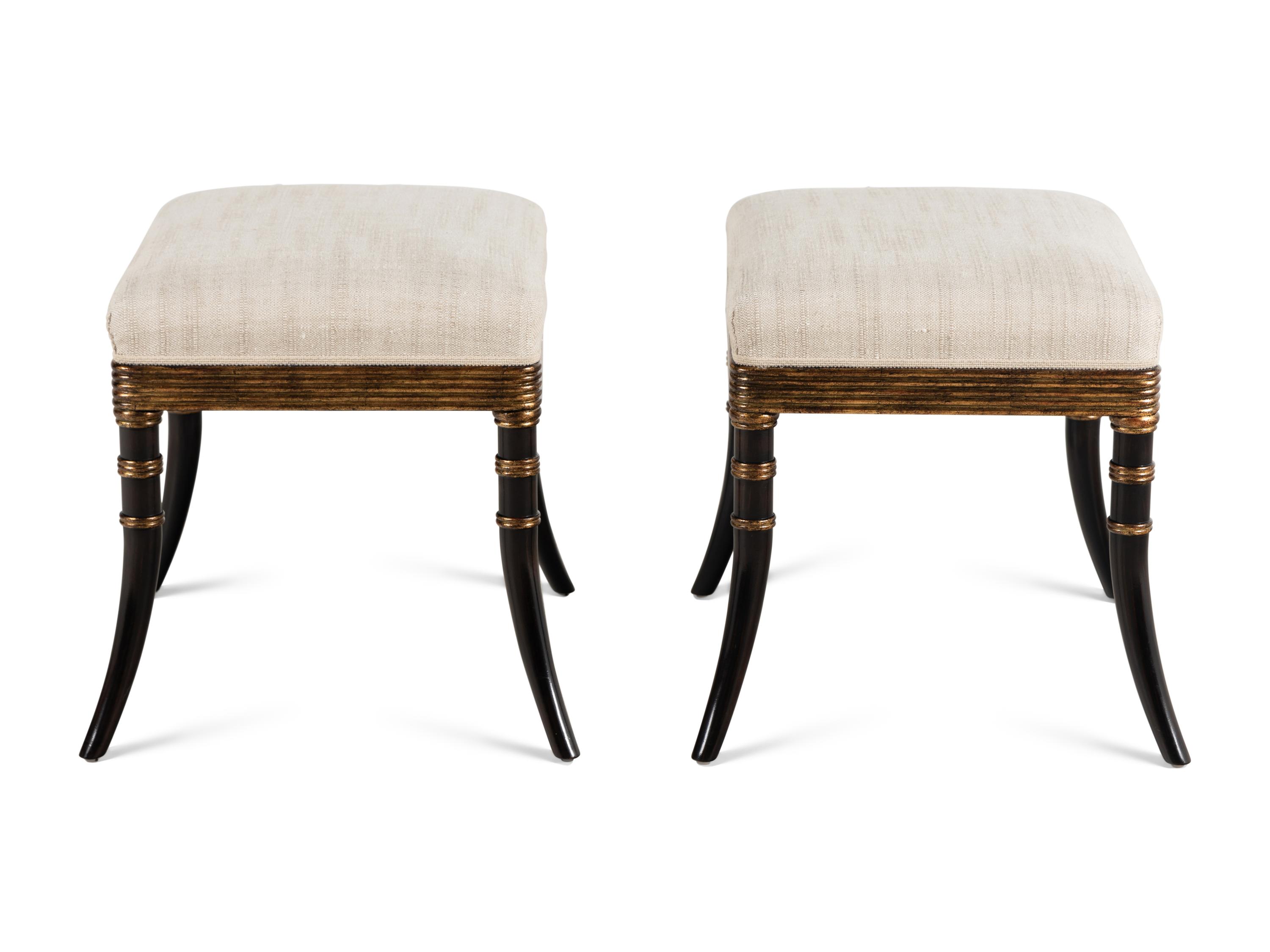 A Pair of Rose Tarlow Ebonized and Parcel-Gilt Stools