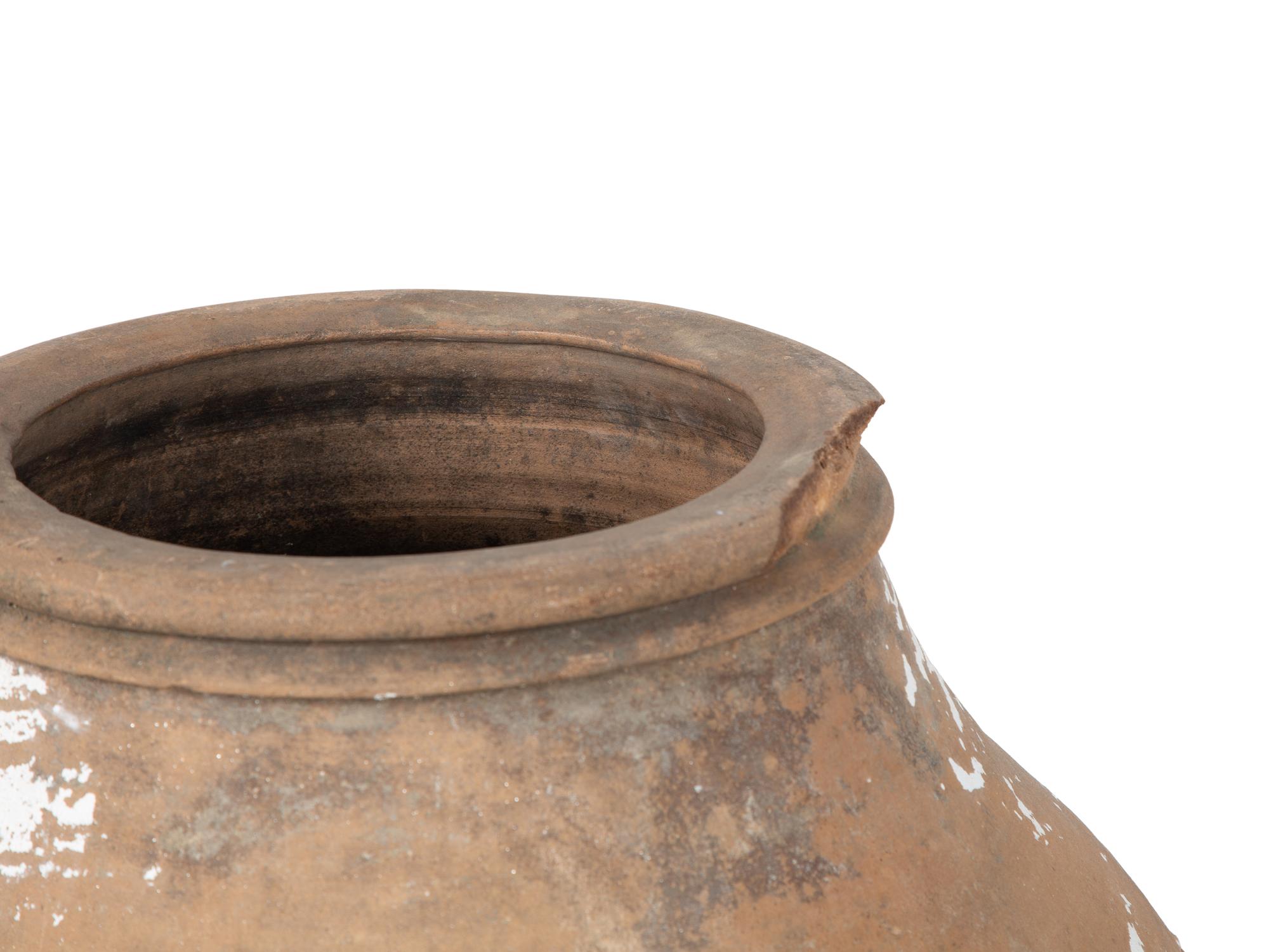 A Mediterranean Glazed Terra Cotta Olive Jar — 19TH/20TH CENTURY