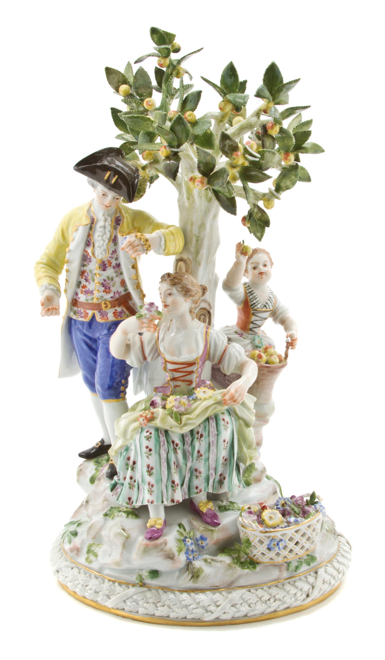 A Meissen Porcelain Figural Group, Height 10 1/2 inches.