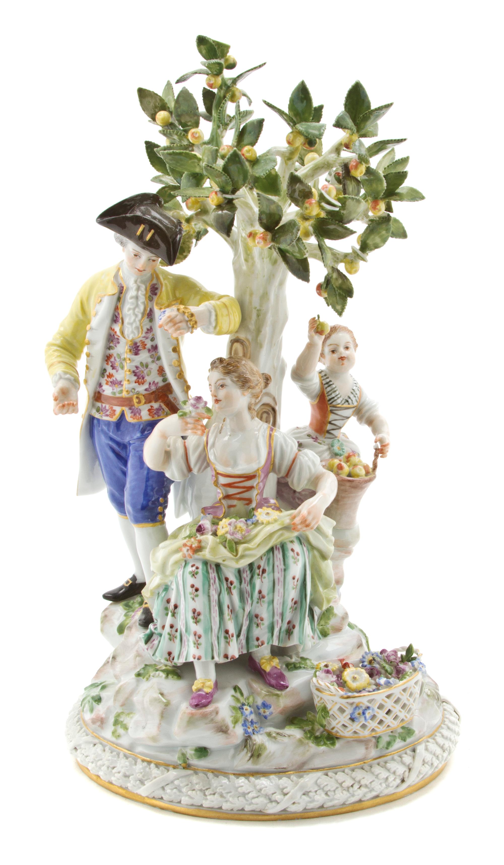 A Meissen Porcelain Figural Group, Height 10 1/2 inches.