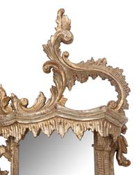 An Venetian Style Silvered Wood Grotto Mirror