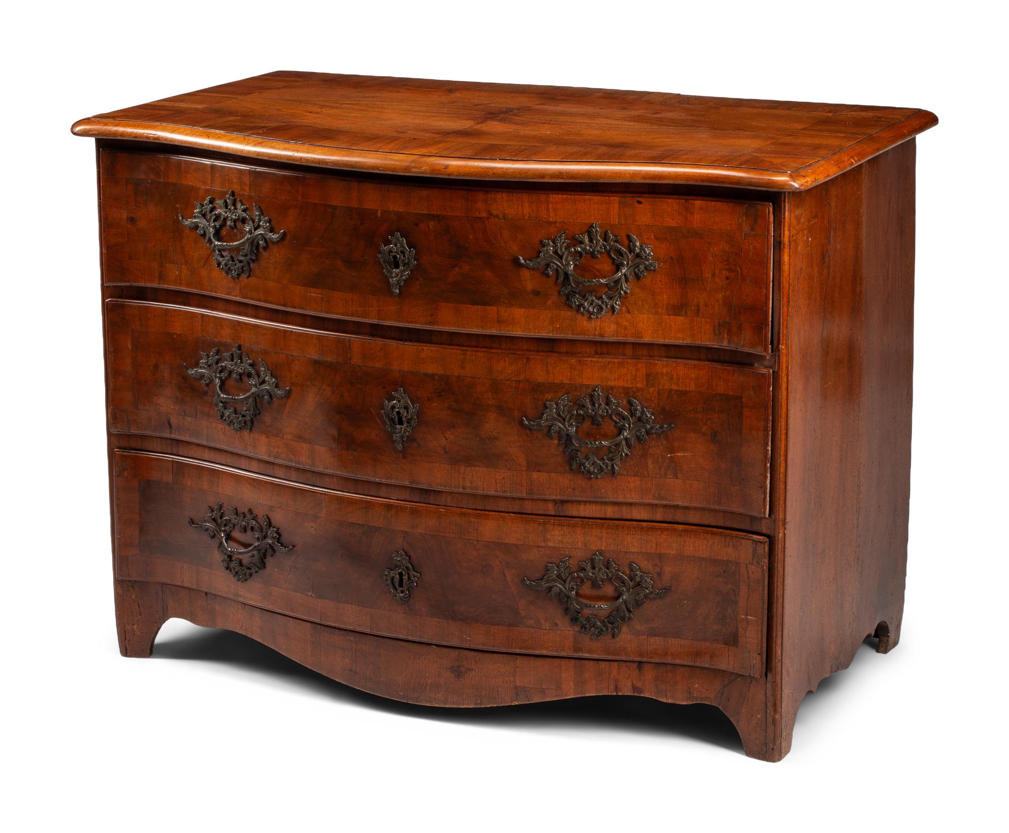 A German Walnut Chest of Drawers