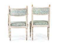 A Set of Ten Italian Painted and Parcel Gilt Dining Chairs with Fortuny Upholstery