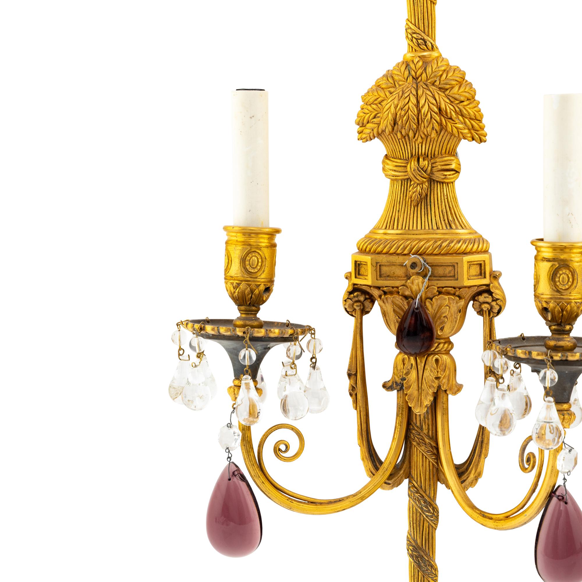 A Pair of French Gilt Bronze and Glass Two Light Sconces