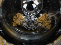 A Set of Three Baccarat Glass Decanters with Gilt Decoration