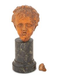 A Continental Terra Cotta Head of a Child