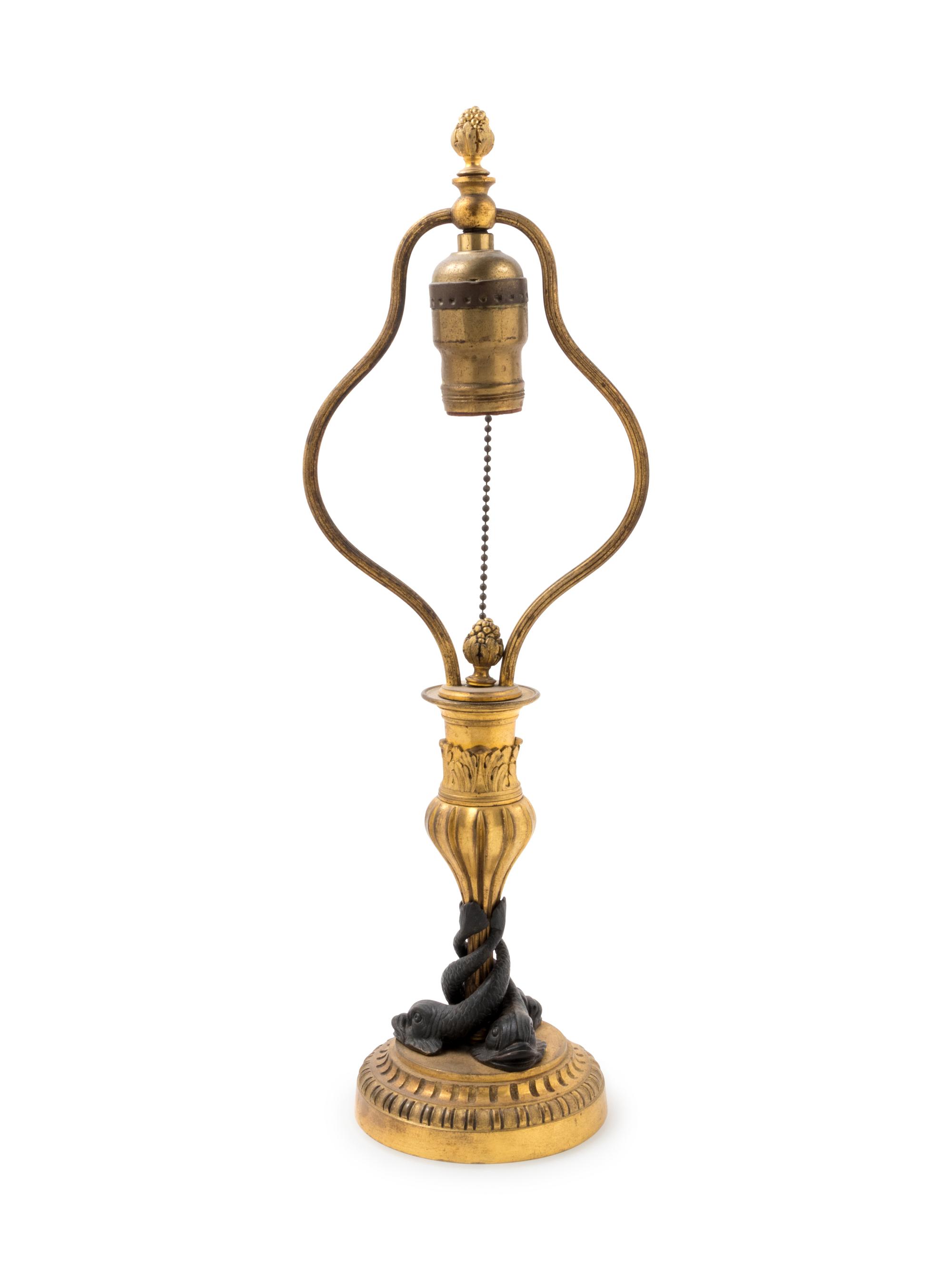 A Louis XVI Style Gilt and Patinated Bronze Table Lamp