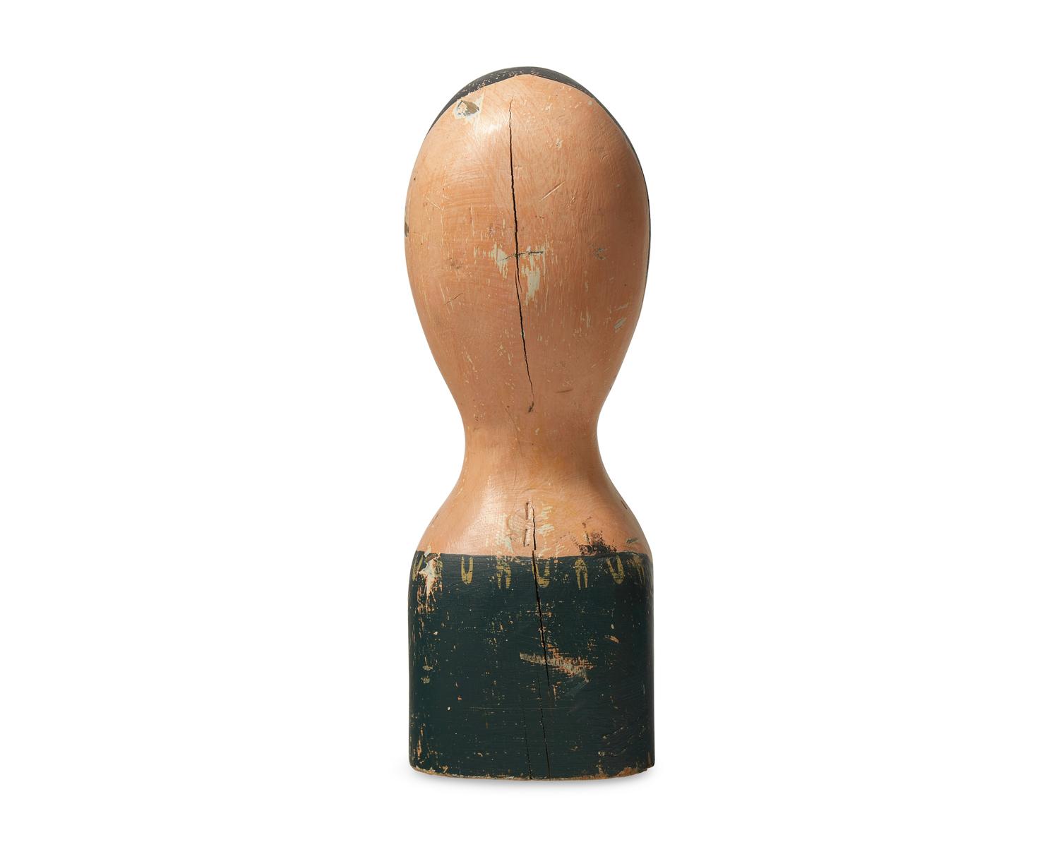 A Carved and Painted Milliner's Model Head