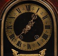 A Napoleon III Gilt Bronze Mounted Tortoiseshell and Ebonized Bracket Clock