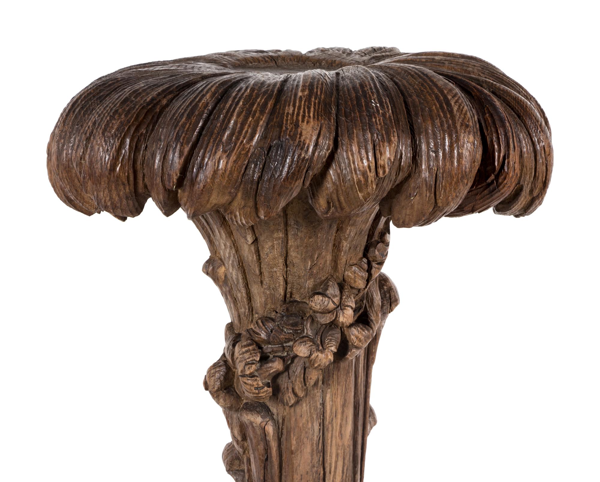 A Continental Carved Oak Figural Pedestal