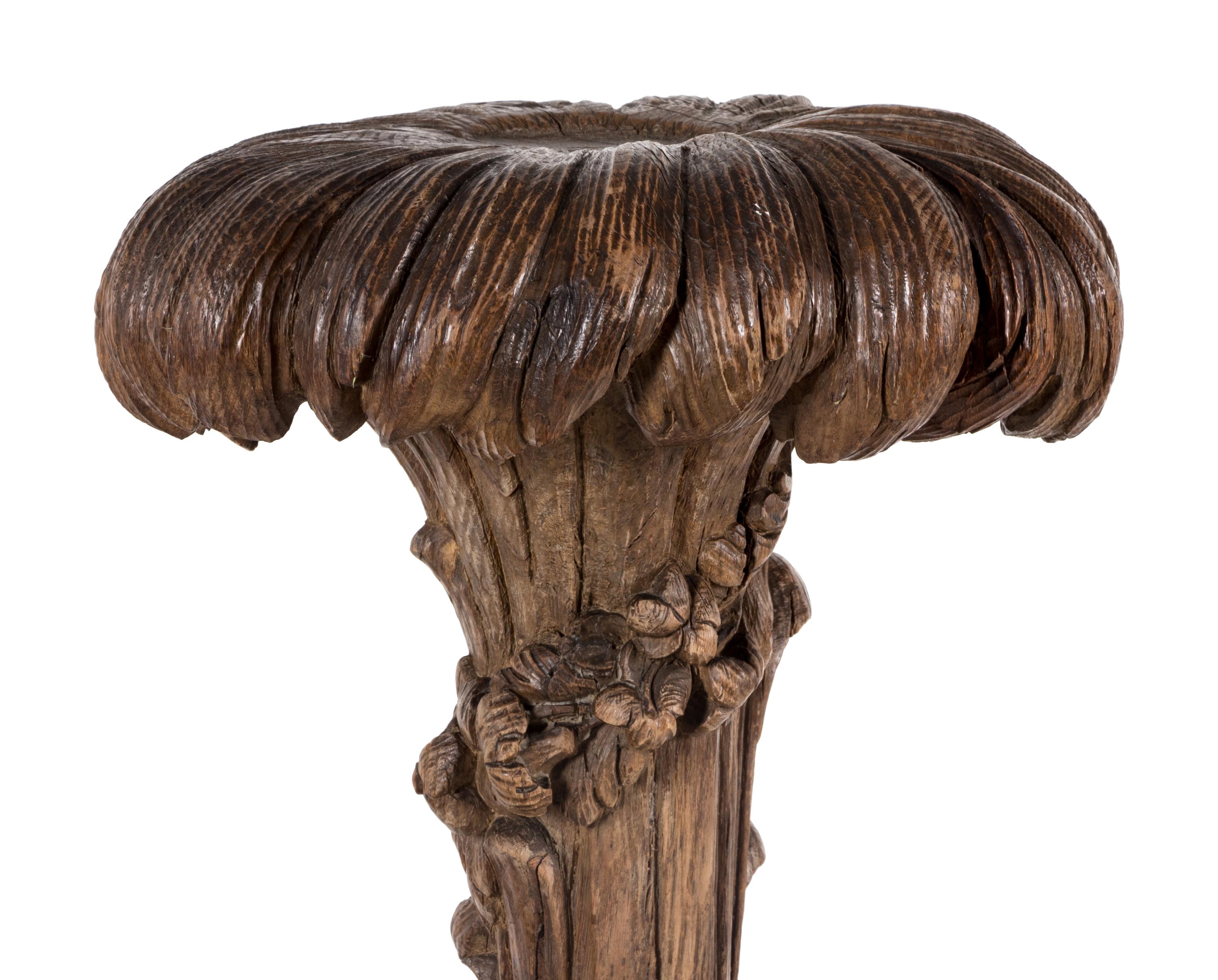 A Continental Carved Oak Figural Pedestal