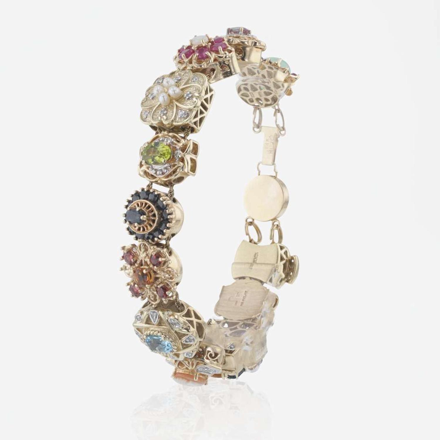 A Yellow Gold Slide Charm Bracelet