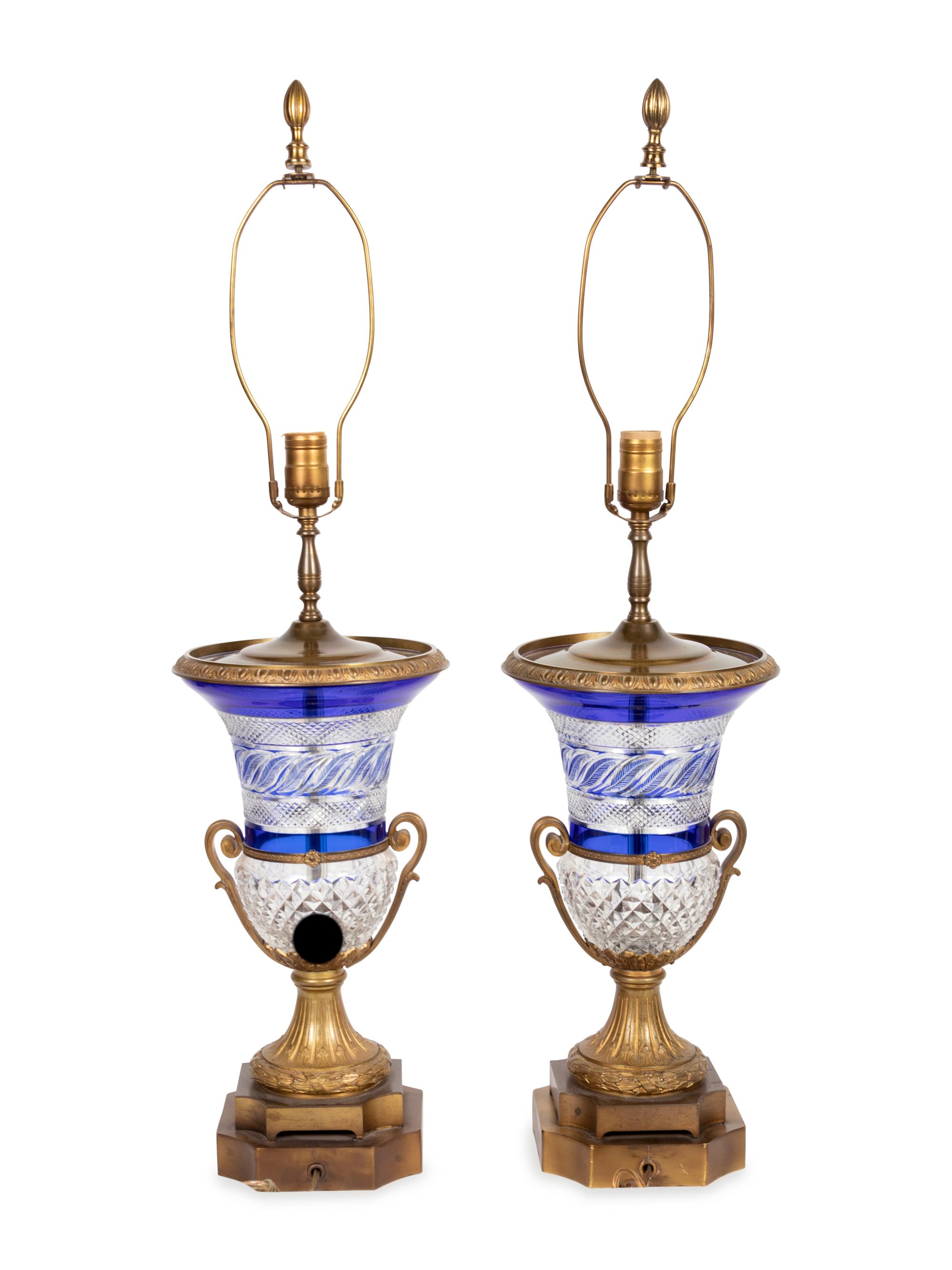 A Pair of French Gilt Bronze Mounted Cut Cobalt and Clear Glass Urns Mounted as Lamps