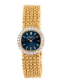 PATEK PHILIPPE, 18K YELLOW GOLD AND DIAMOND WATCH