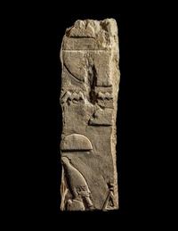 An Egyptian Limestone Relief Fragment with a Pharaoh