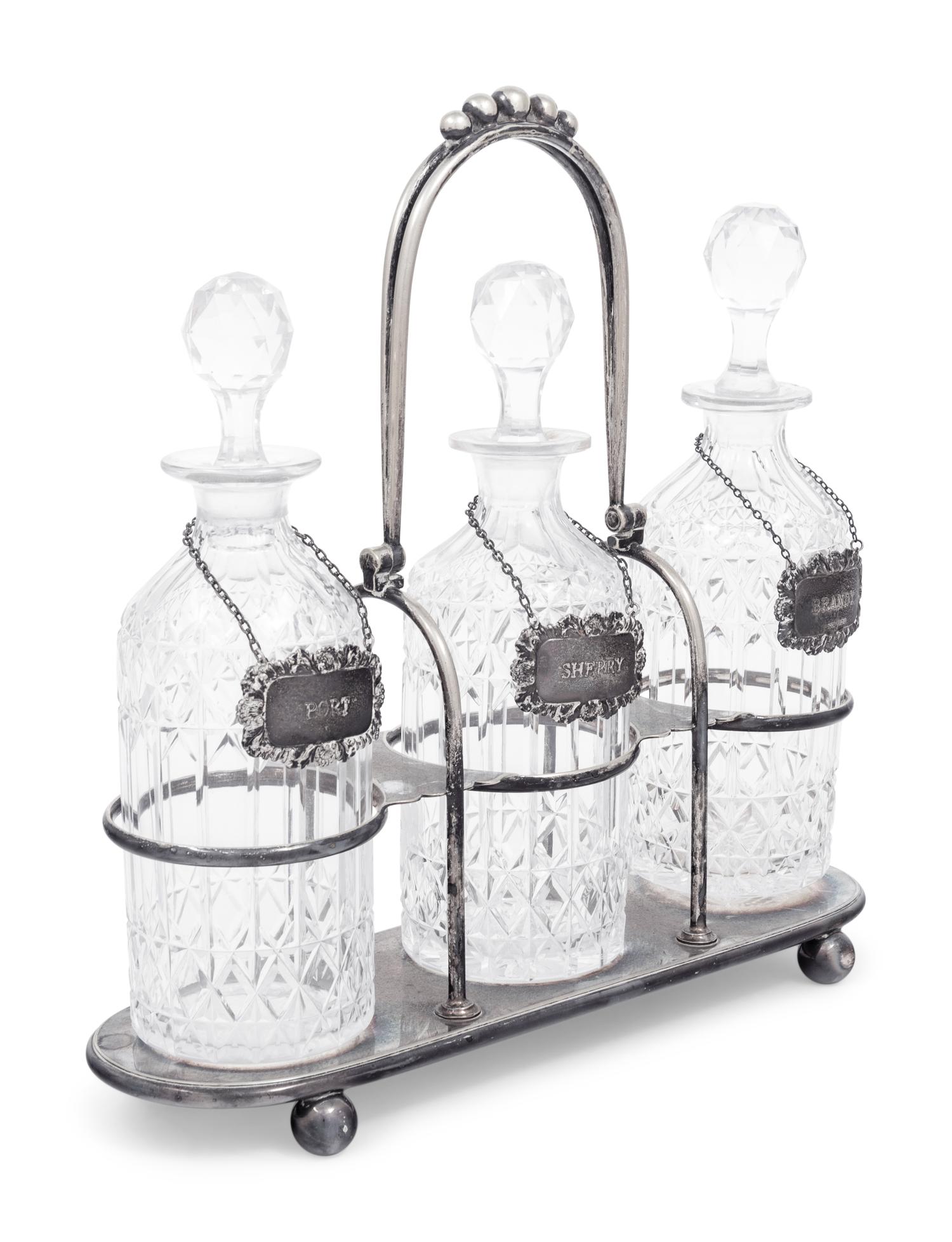 A Silver-Plate and Cut Glass Tantalus