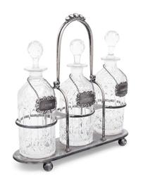 A Silver-Plate and Cut Glass Tantalus