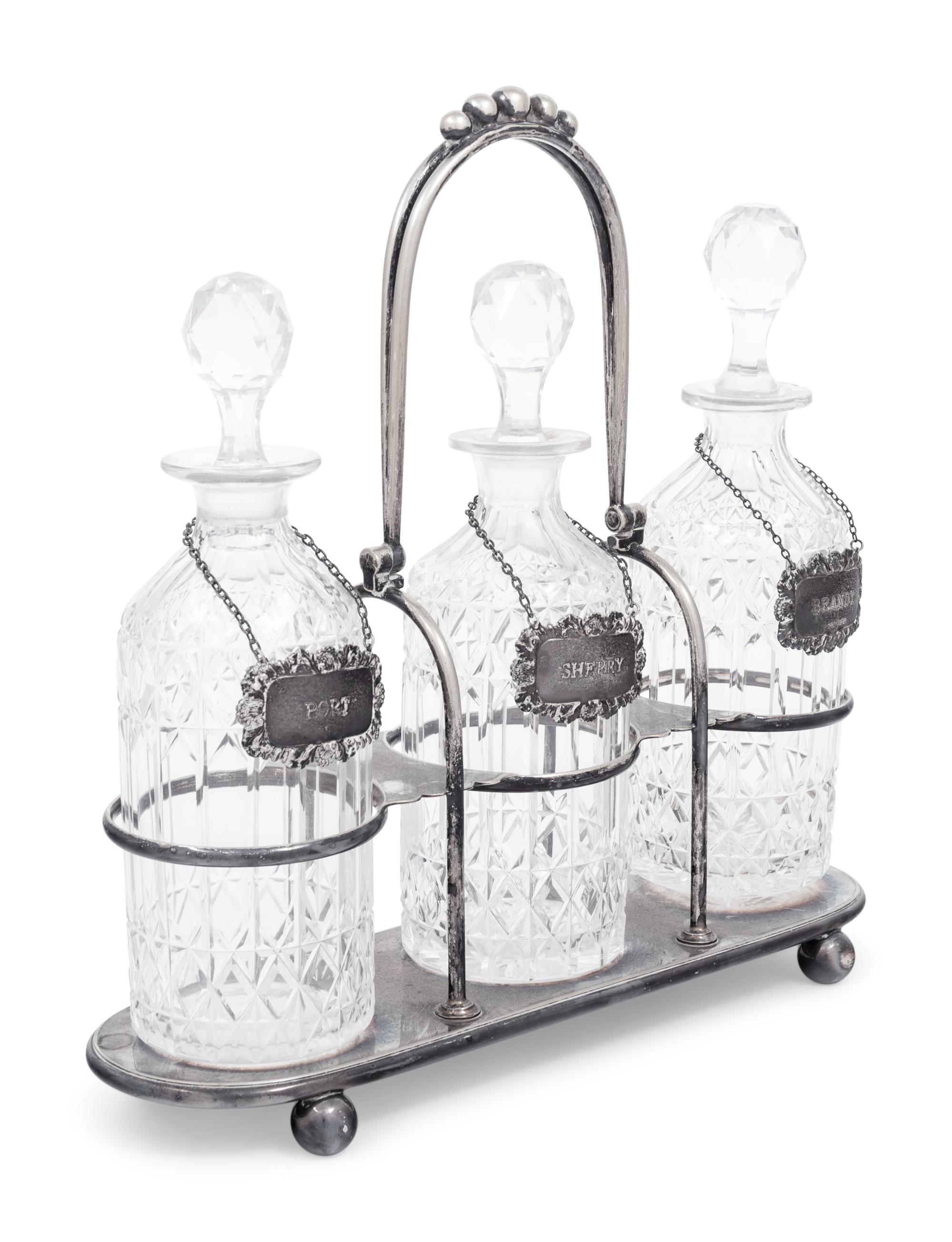 A Silver-Plate and Cut Glass Tantalus