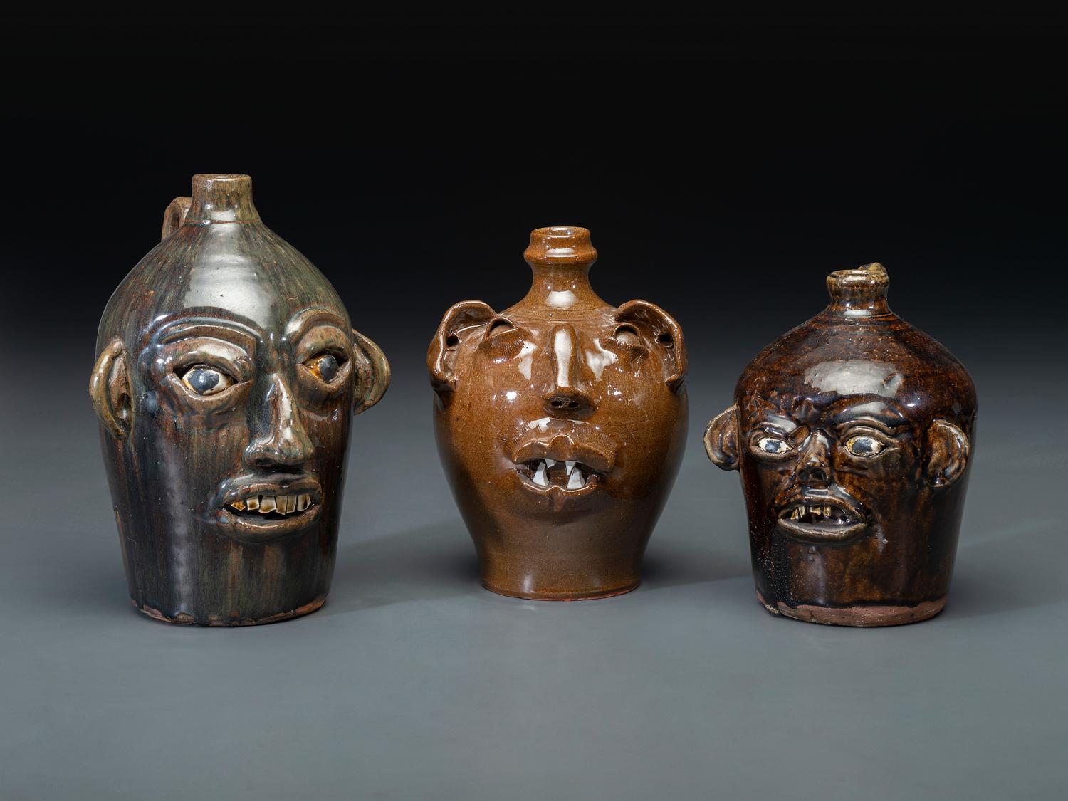 Three Southern Stoneware Face Jugs