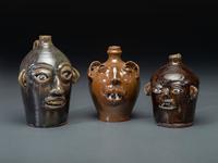Three Southern Stoneware Face Jugs