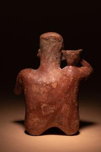 A Colima Terracotta Female with Basket Figure