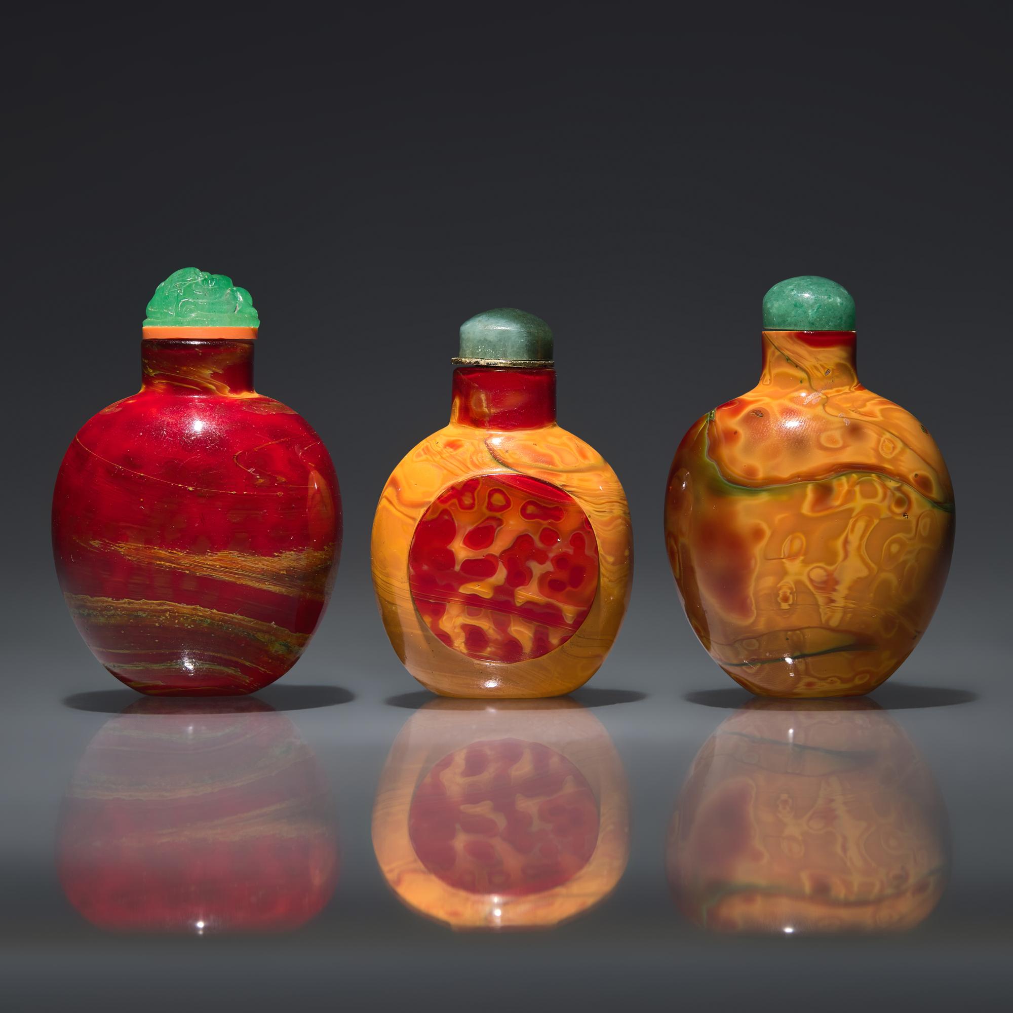Three Chinese "Realgar" Glass Snuff Bottles, Qing Dynasty, 18th-19th Century — 清中期 雄黃料鼻煙壺三支
