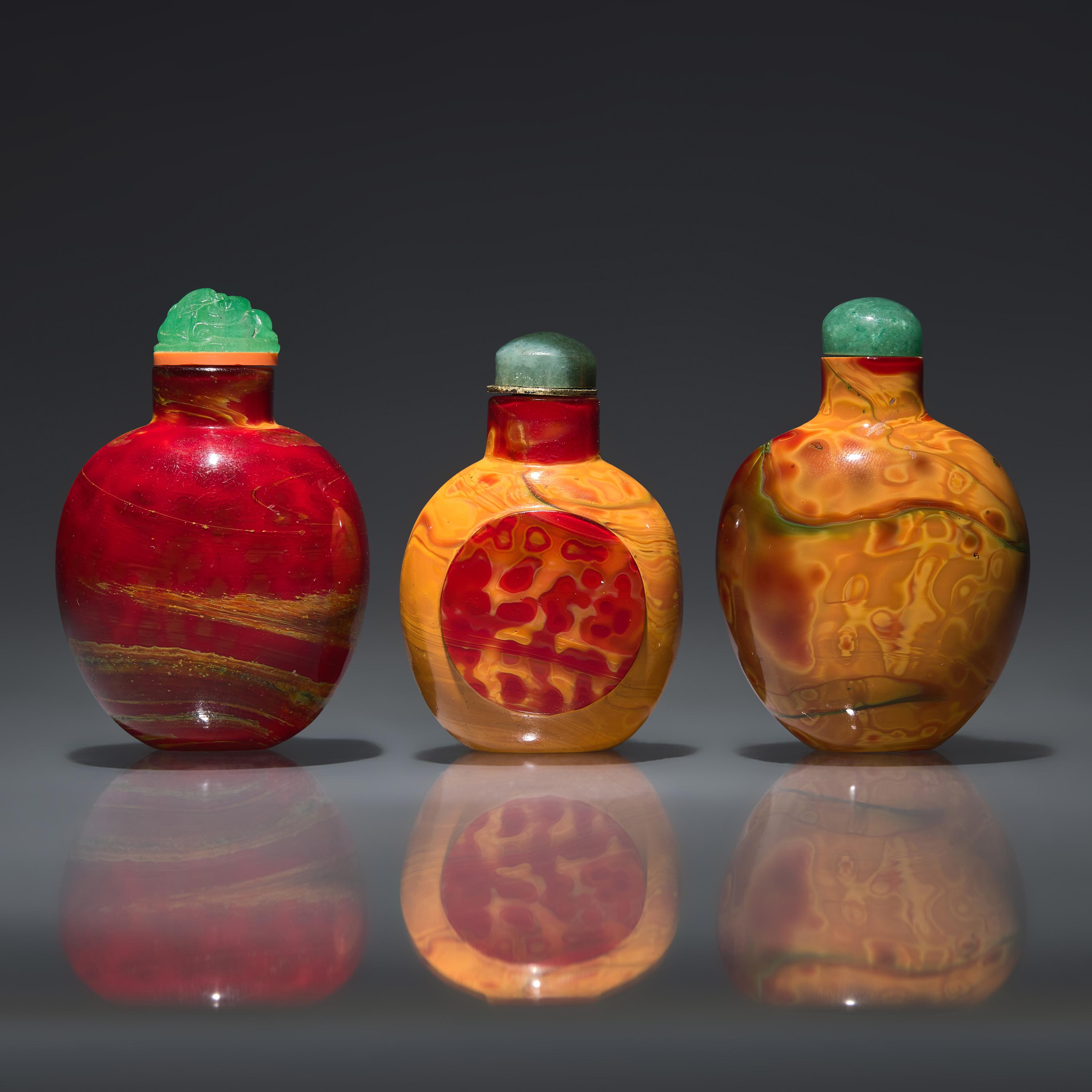 Three Chinese "Realgar" Glass Snuff Bottles, Qing Dynasty, 18th-19th Century — 清中期 雄黃料鼻煙壺三支