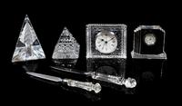 Waterford, a group of six crystal table articles, comprising two clocks, two paperweights and two letter openers