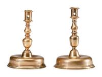 A Near Pair of Dutch William and Mary Brass Bell-Bottom Candlesticks