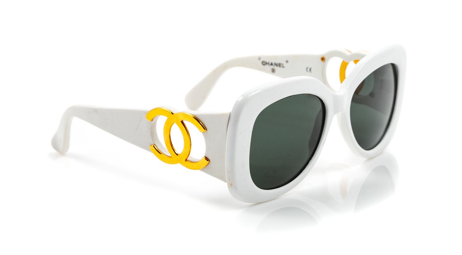 A Pair of Chanel White Sunglasses,