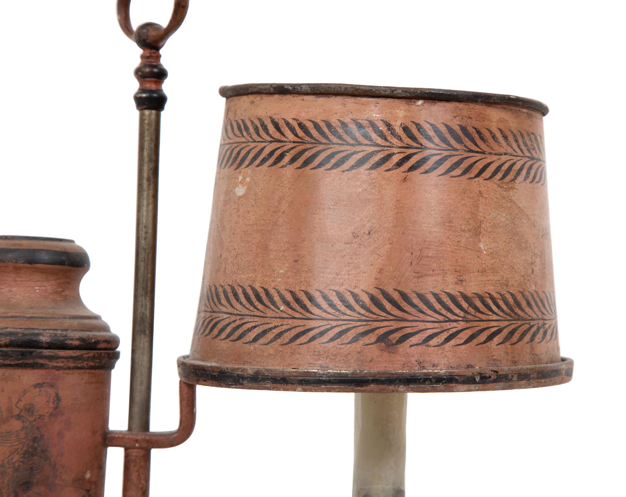 A French Tôle Peinte and Cast Iron Oil Lamp