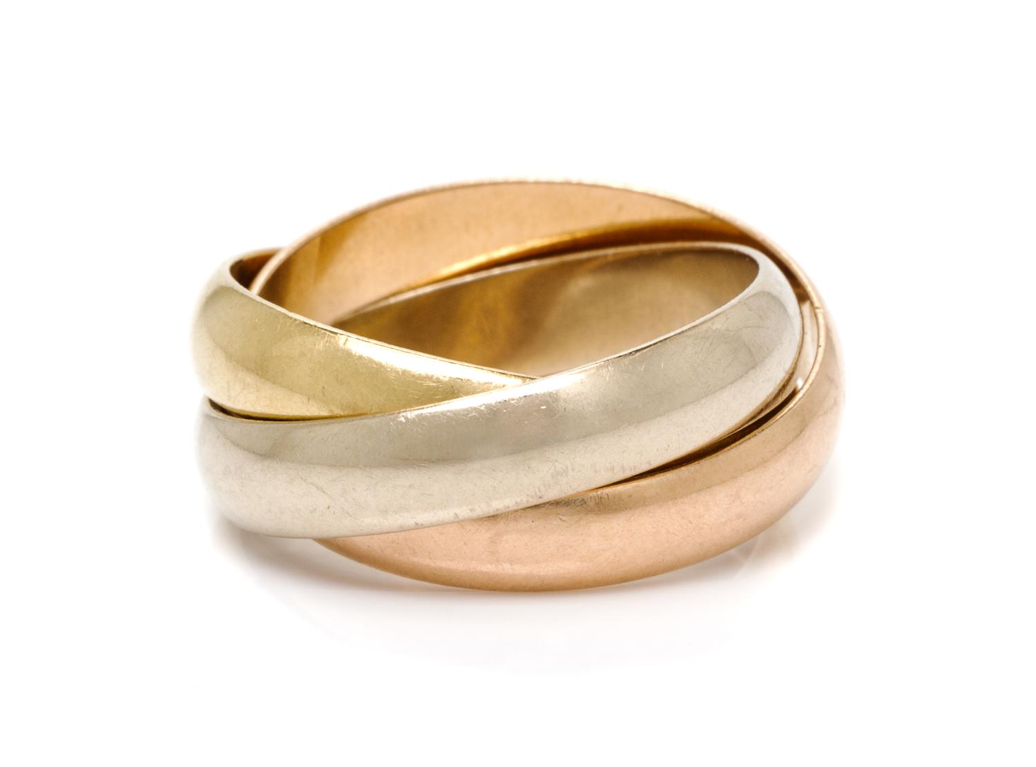 An 18 Karat Tricolor Gold Trinity Ring, Les Must de Cartier, 4.20 dwts.