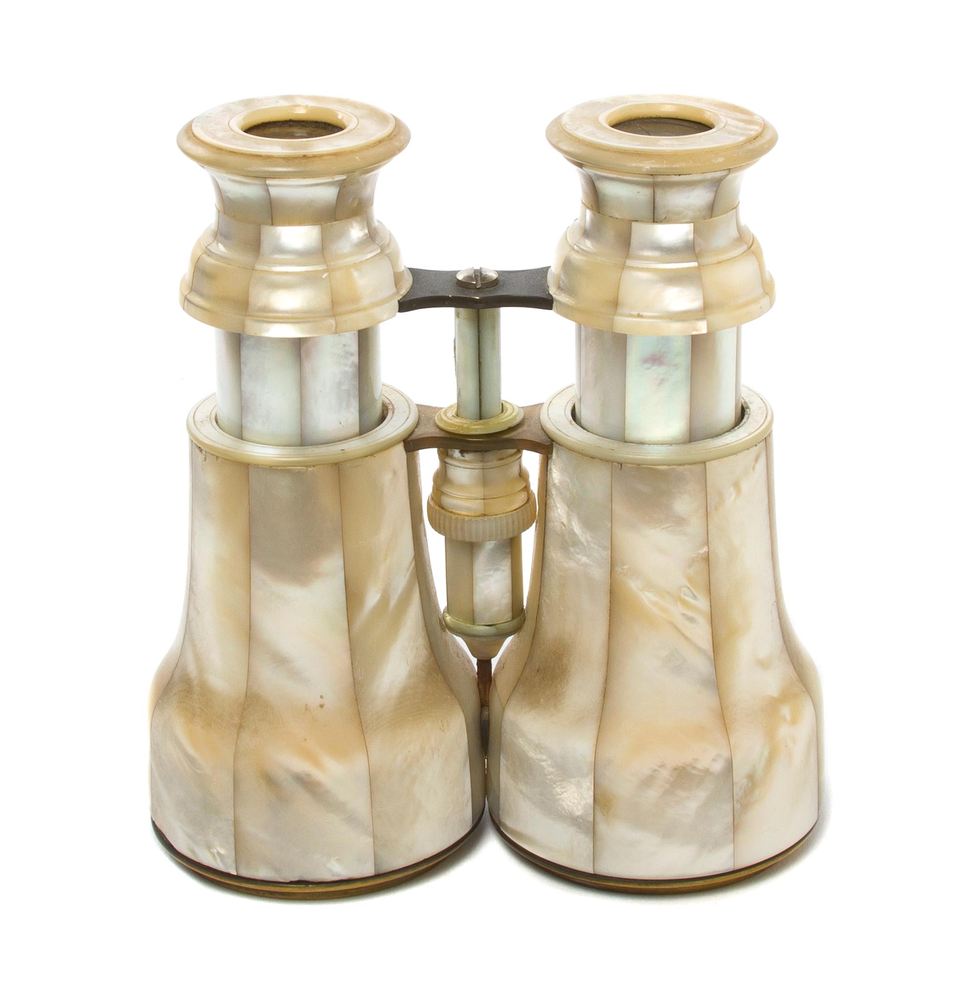A Pair of French Mother-of-Pearl Veneered Binoculars, Width 5 1/8 inches.