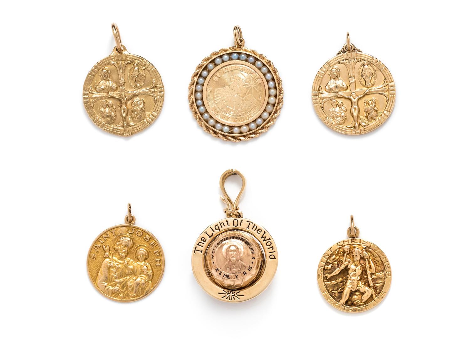 COLLECTION OF YELLOW GOLD RELIGIOUS CHARMS