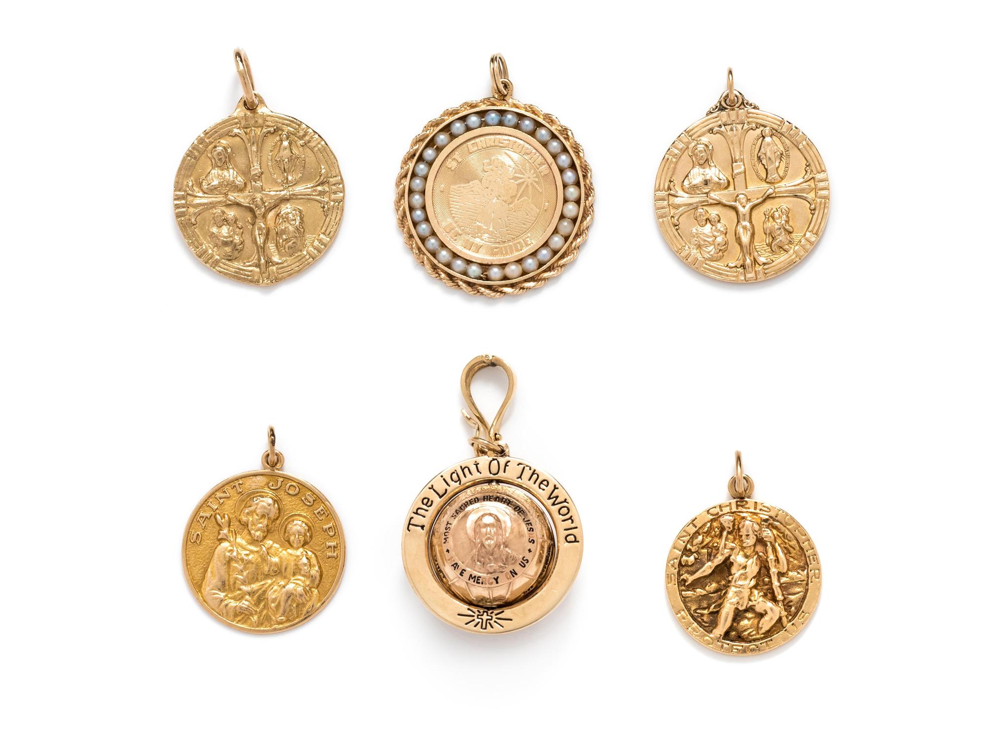 COLLECTION OF YELLOW GOLD RELIGIOUS CHARMS