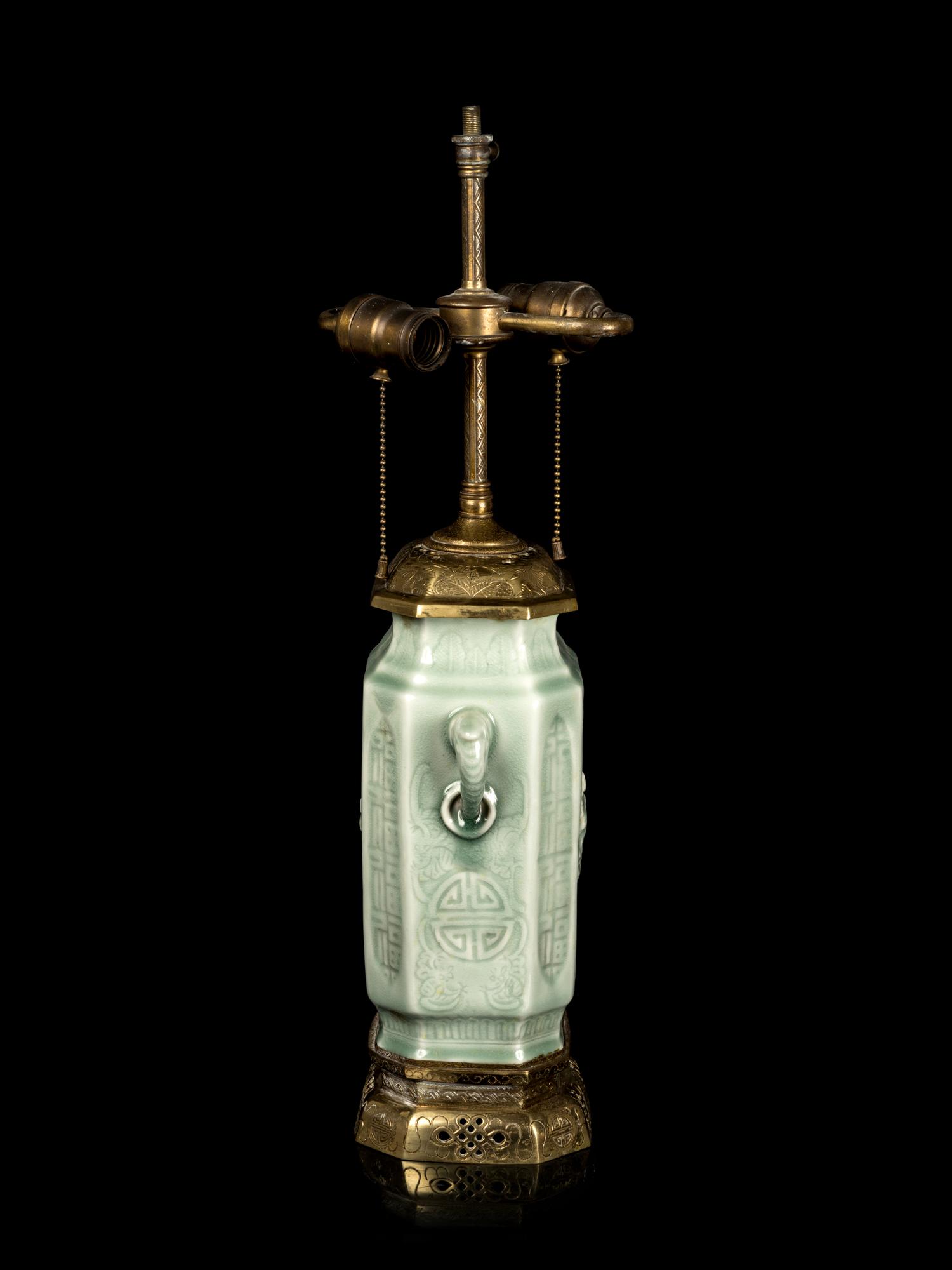 A Chinese Molded Celadon Glazed Vase