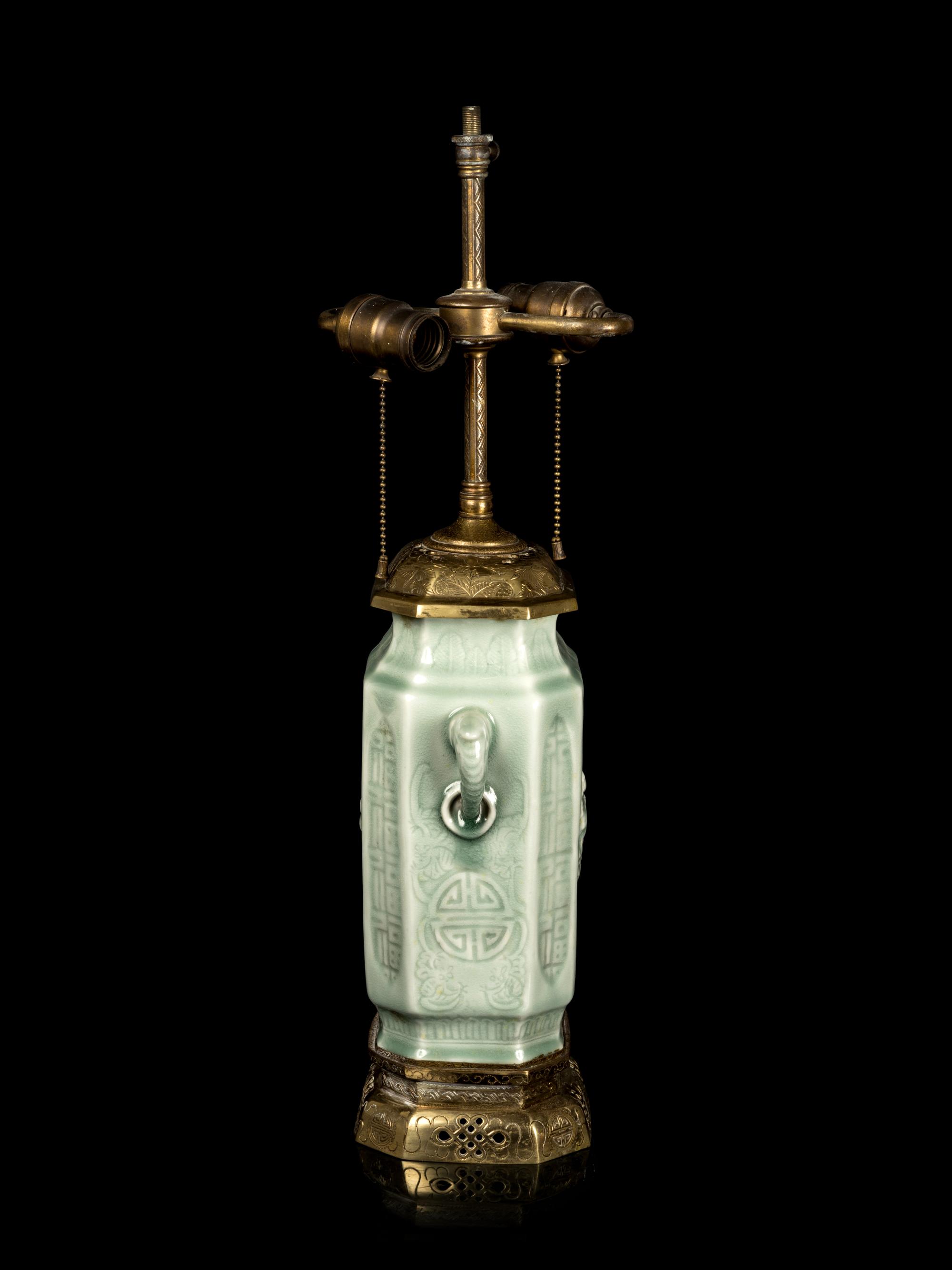 A Chinese Molded Celadon Glazed Vase