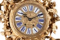 A Louis XV Style Gilt Bronze Cartel Clock