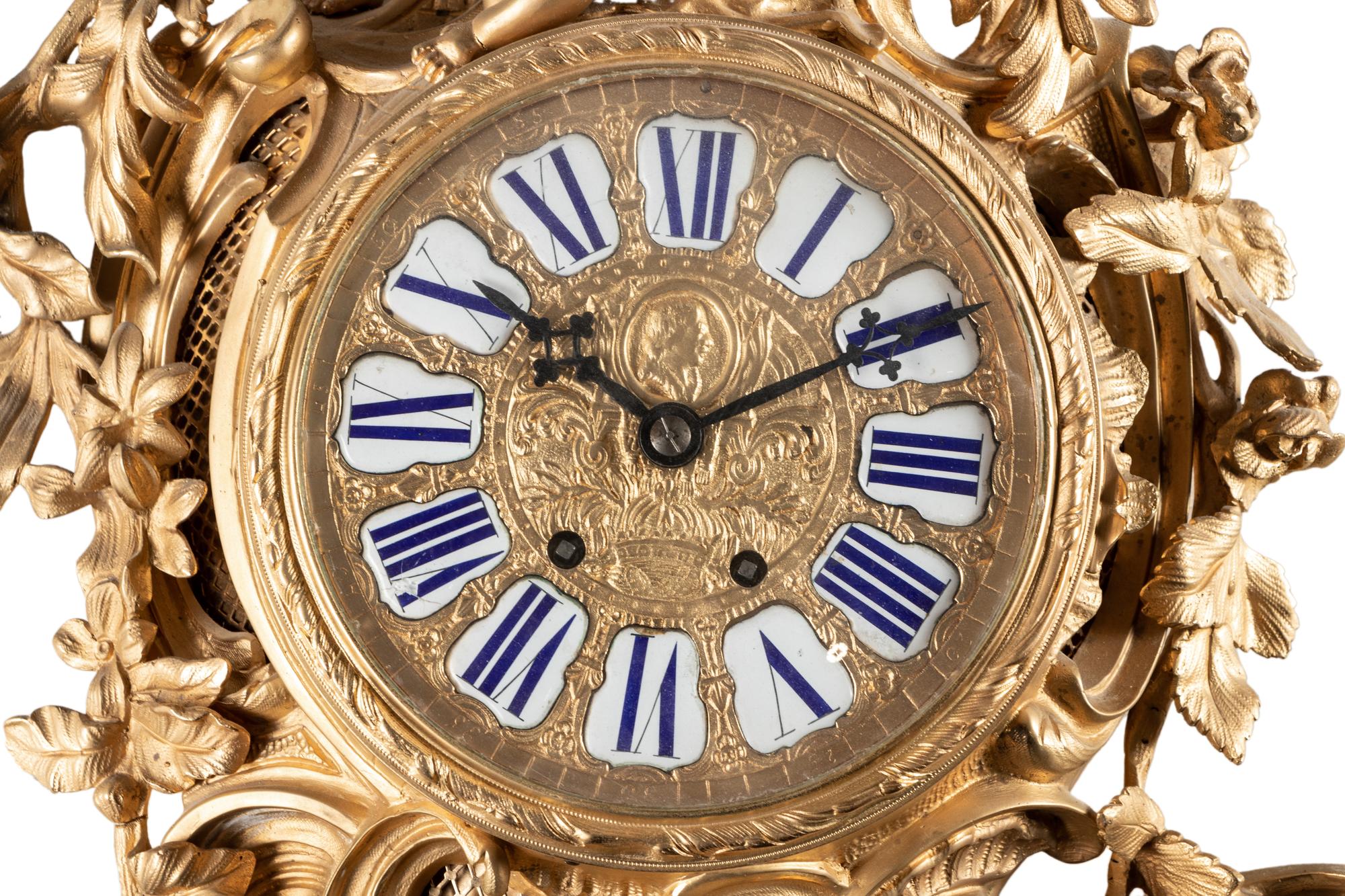 A Louis XV Style Gilt Bronze Cartel Clock