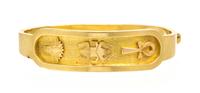 An 18 Karat Yellow Gold Egyptian Motif Bangle Bracelet, 15.60 dwts.