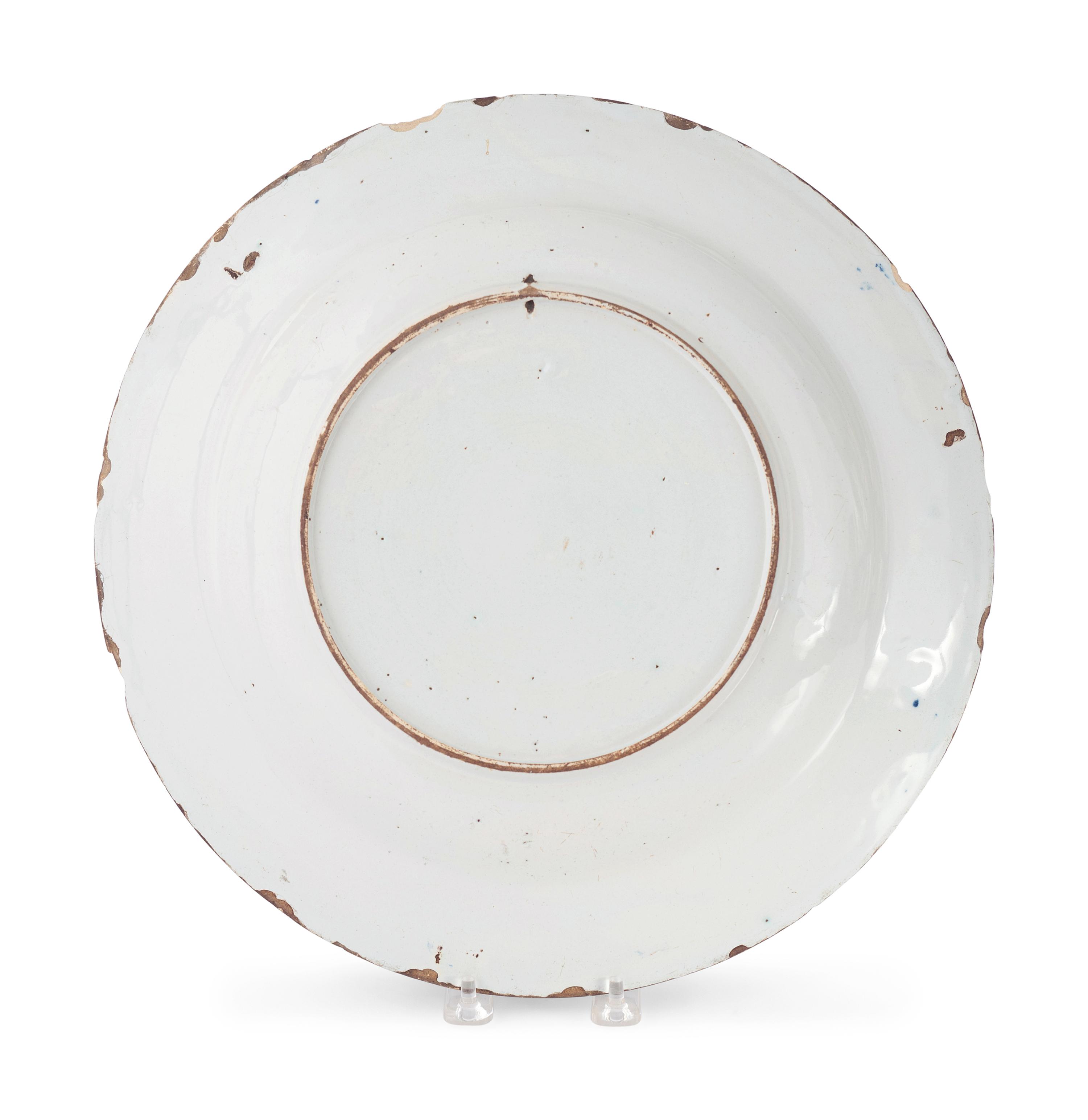 A Dutch Blue and White Glazed Delftware Charger