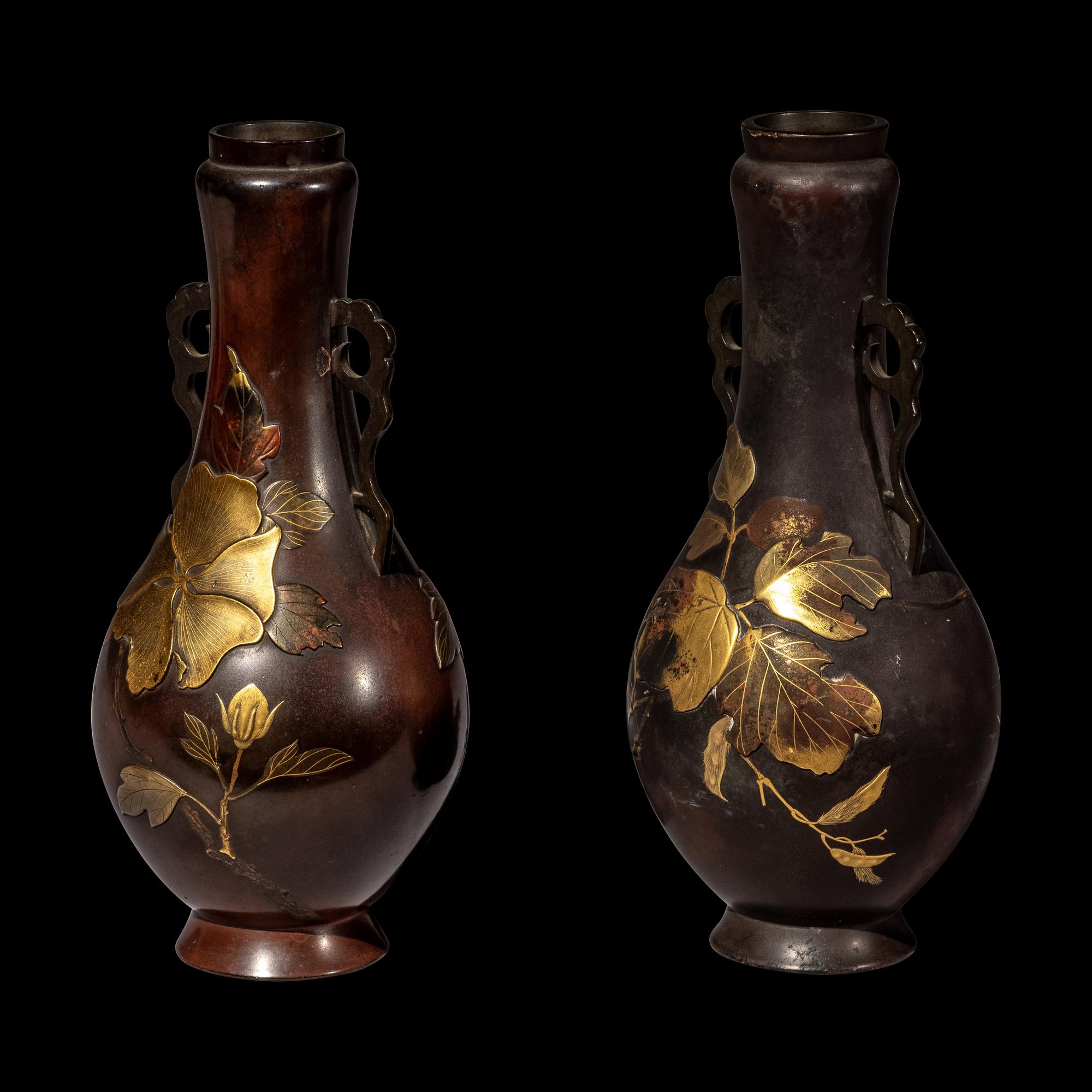 A Pair of Japanese Gilt Highlighted Bronze Handled Vases