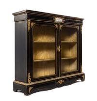 A Napoleon III Gilt Bronze Mounted and Porcelain Inset Ebonized Vitrine Cabinet