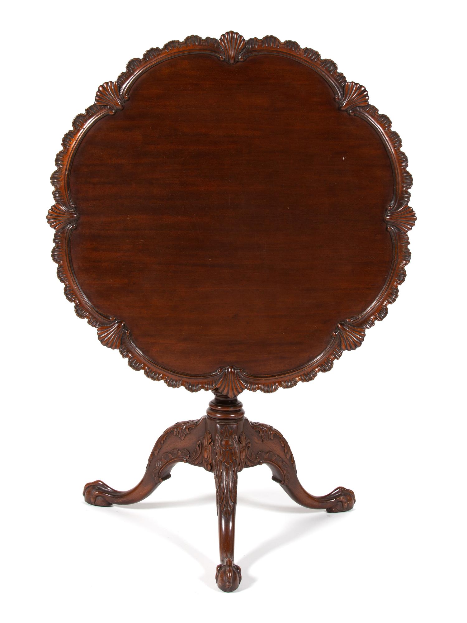 A George II Style Carved Mahogany Tilt Top Table