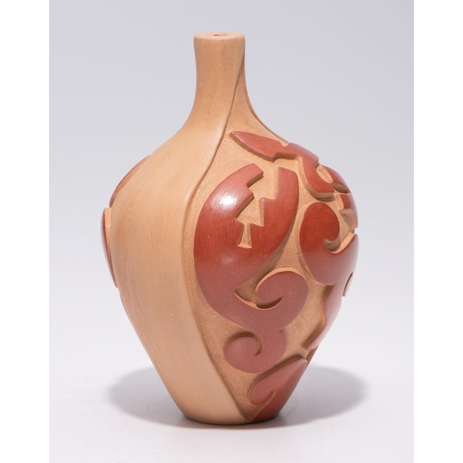Carved Micaceous Redware Jar, with Avanyu and Raindrops