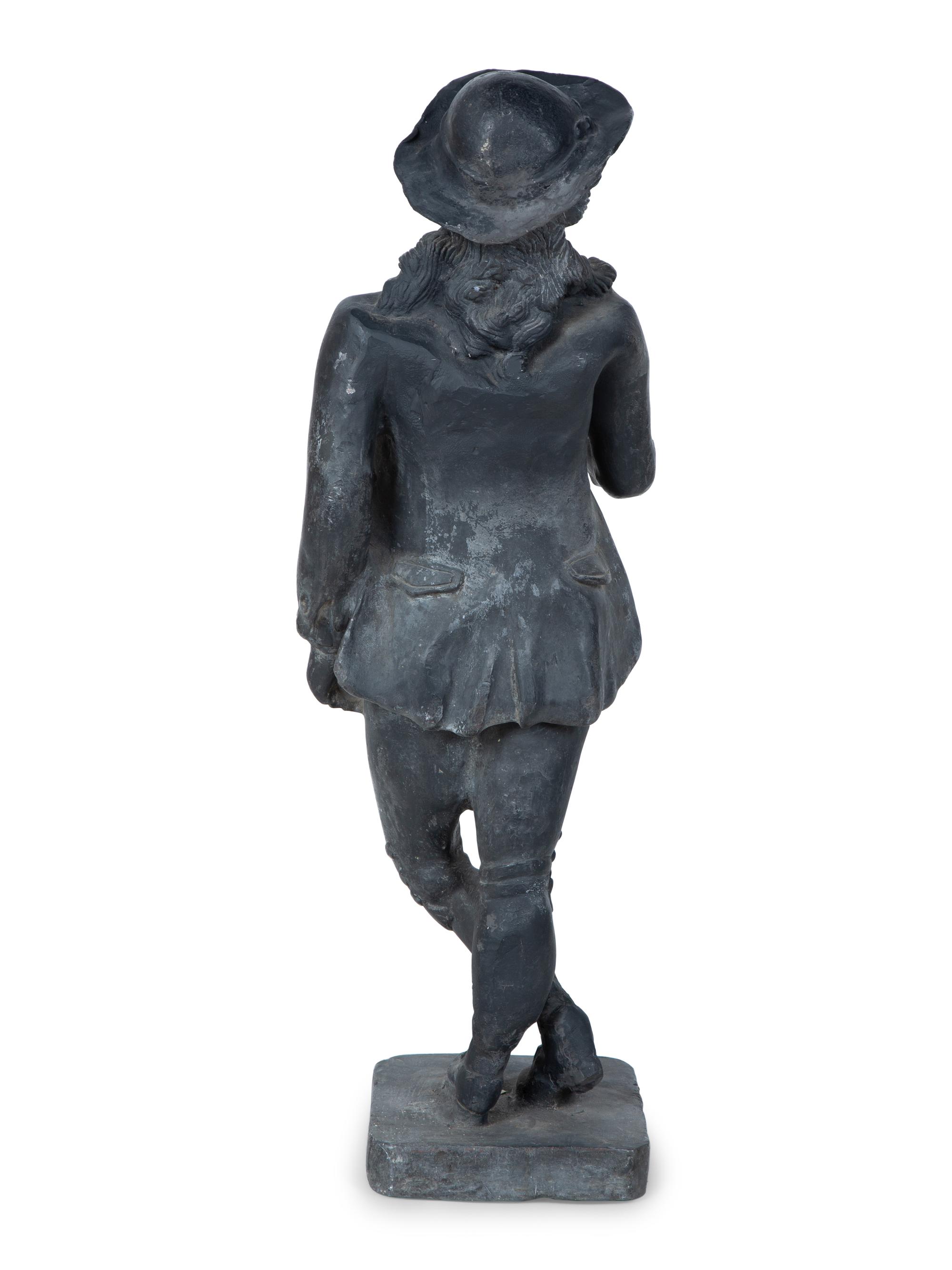 A Cast Lead Garden Figure — EARLY 20TH CENTURY