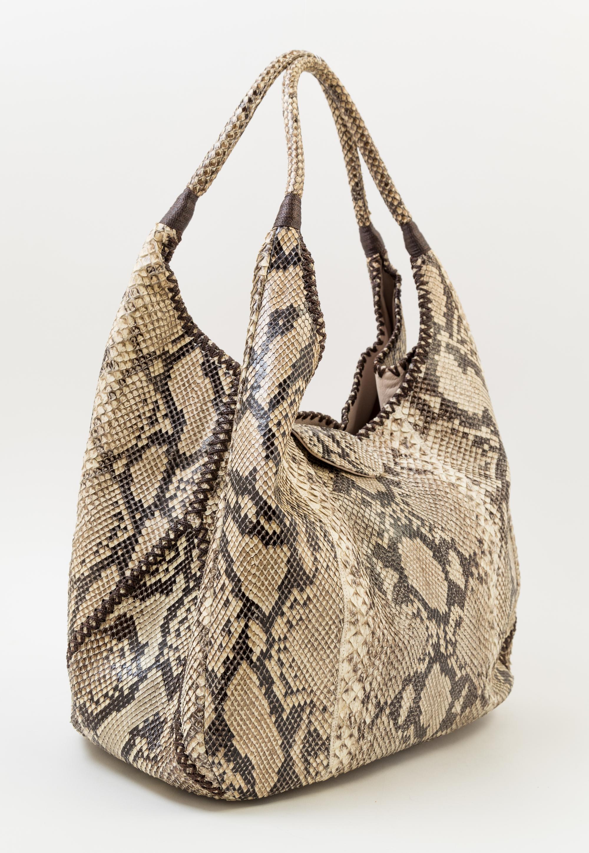 A Carlos Falchi Snakeskin Shoulder Bag, 13" x 11.5" x 7"; Strap drop: 11".